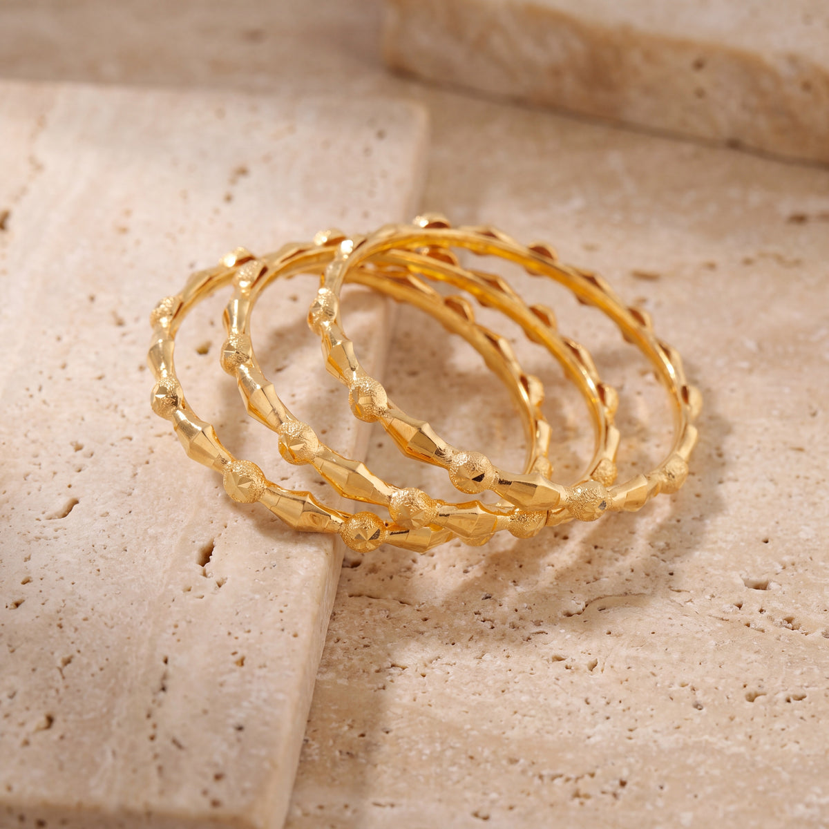 Kid's Bangles (D18-N) on travertine stone