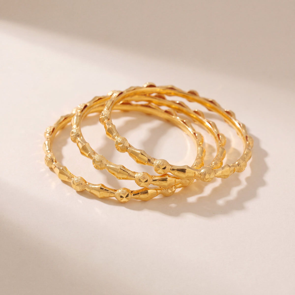 Kid's Bangles (D18-N) in 925 silver with 24K gold plating, studio photo