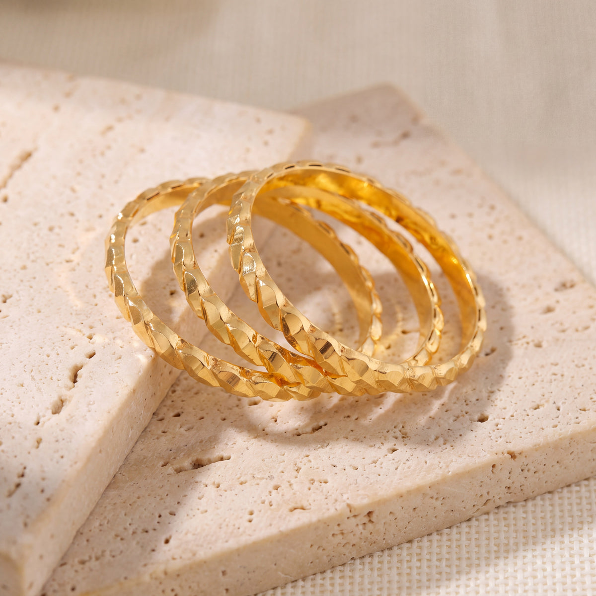 Kid's Bangles (D19-N) on travertine stone