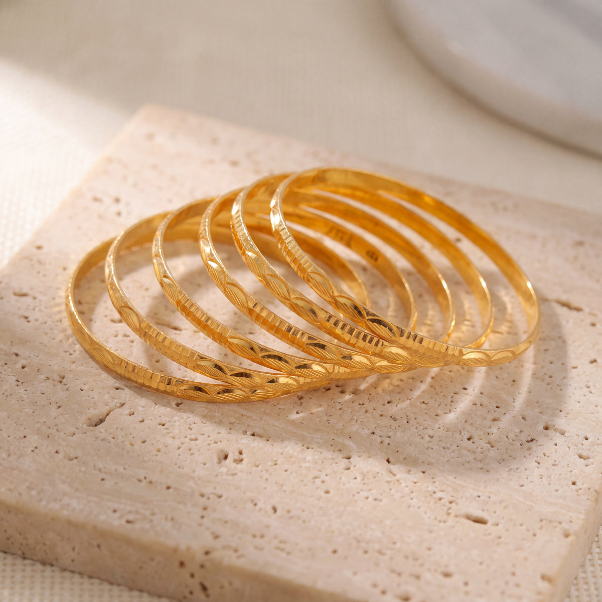 Kid's Bangles (D20-N) on travertine stone