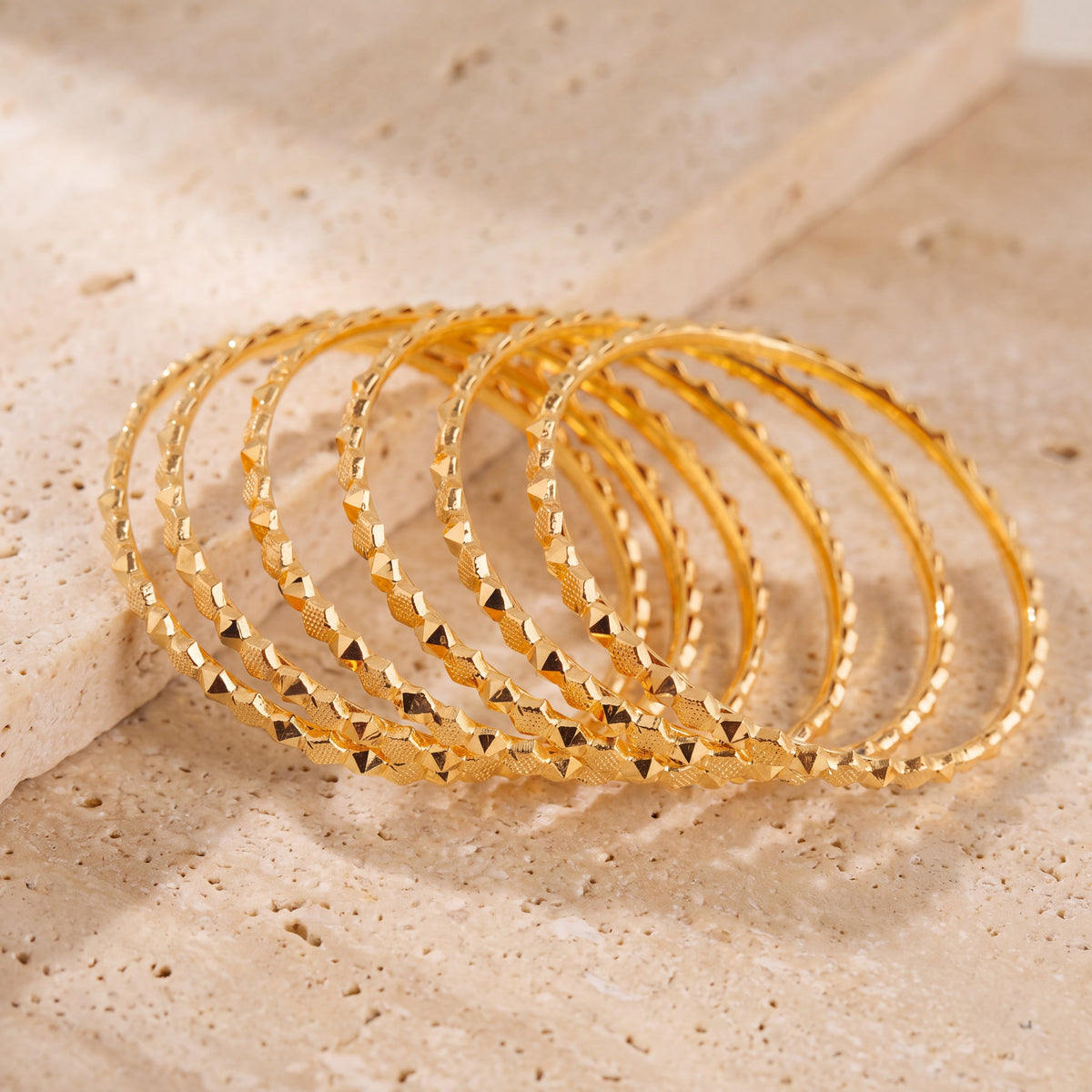 Kid's Bangles (D22-N) on travertine stone