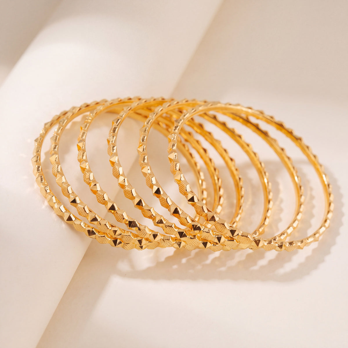 Kid's Bangles (D22-N) in 925 silver with 24K gold plating, studio photo