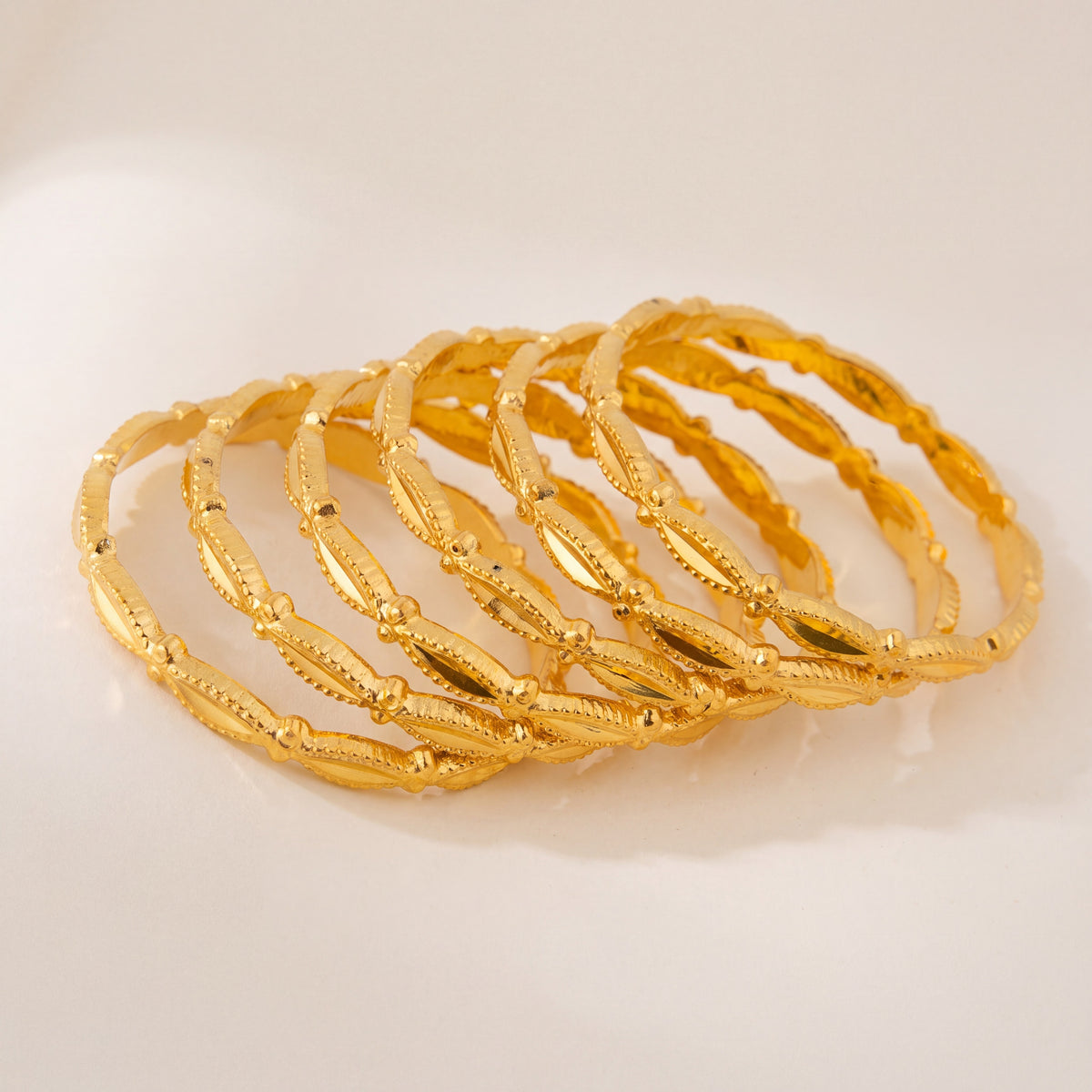 Kid's Bangles (D24-K) in 925 silver with 24K gold plating, studio photo