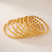 Kid's Bangles (D25-K) in 925 silver with 24K gold plating, studio photo