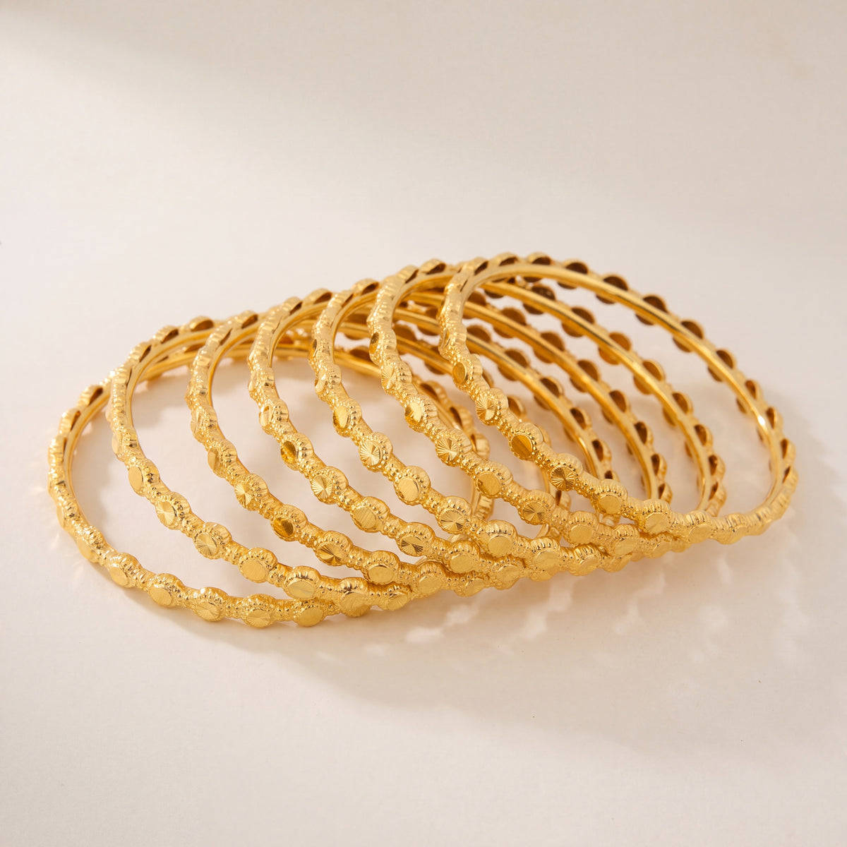 Kid's Bangles (D25-K) in 925 silver with 24K gold plating, studio photo