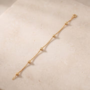 Light Weight Bracelet (D1) on travertine