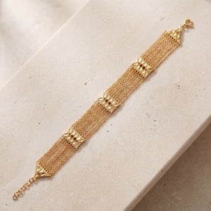 Linked Squares Bracelet (D1) on travertine