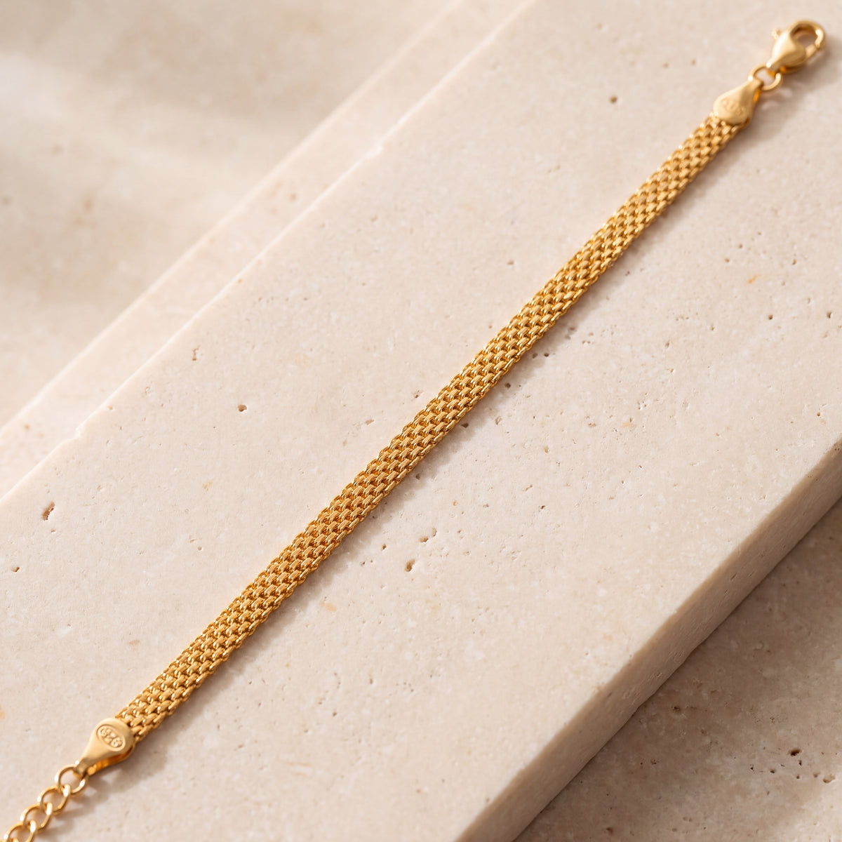 Mesh Chain Bracelet (D4) on travertine