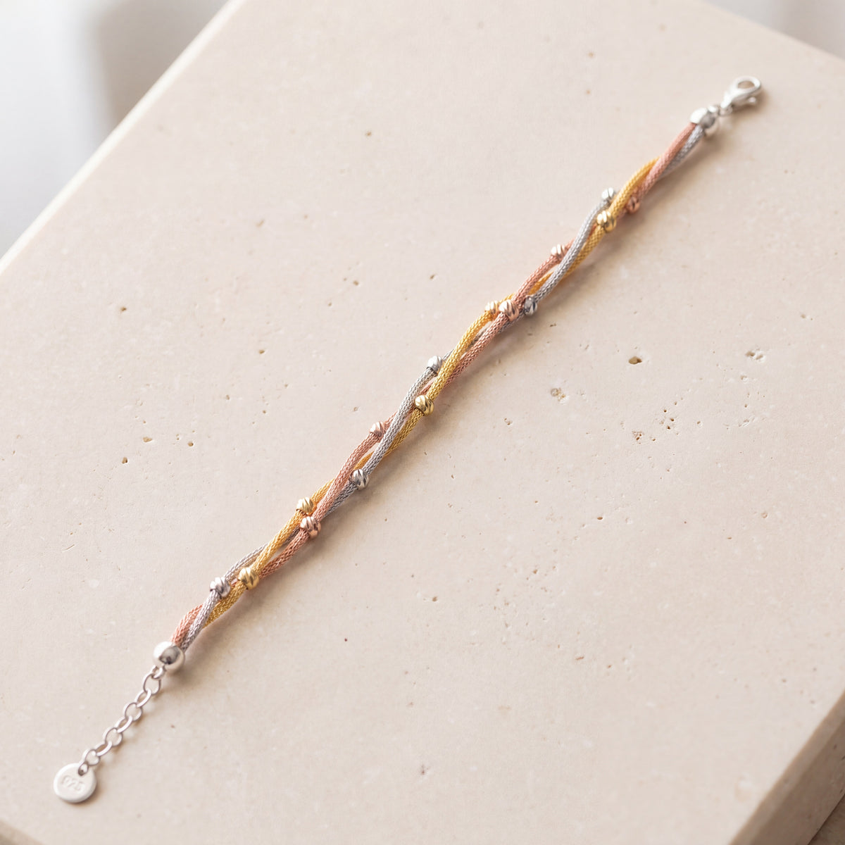 Multi Color Bracelet (D1) on travertine