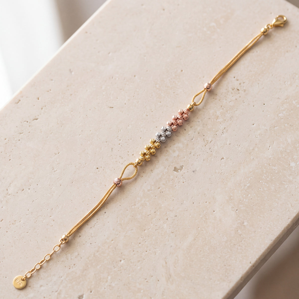 Multi Color Bracelet (D8) on travertine