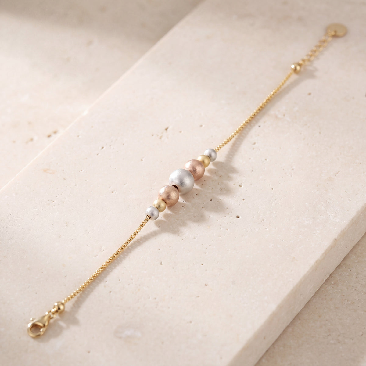 Multi Color Bracelet (D9) on travertine