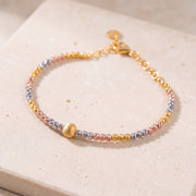 Multi Color Cuff Bracelet (D1) on travertine