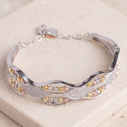 Multi Color Cuff Bracelet (D16) on travertine