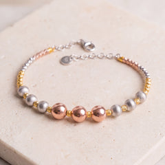 Multi Color Cuff Bracelet (D5) on travertine