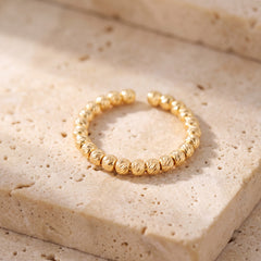 Open Bead Ring (1 Line) on travertine