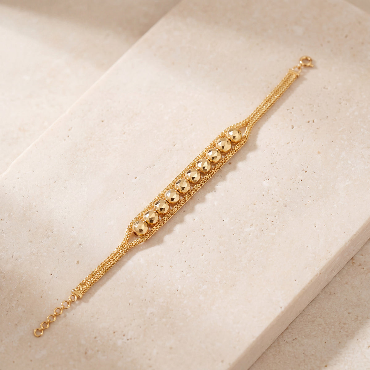 Patta Bracelet (D16) on travertine