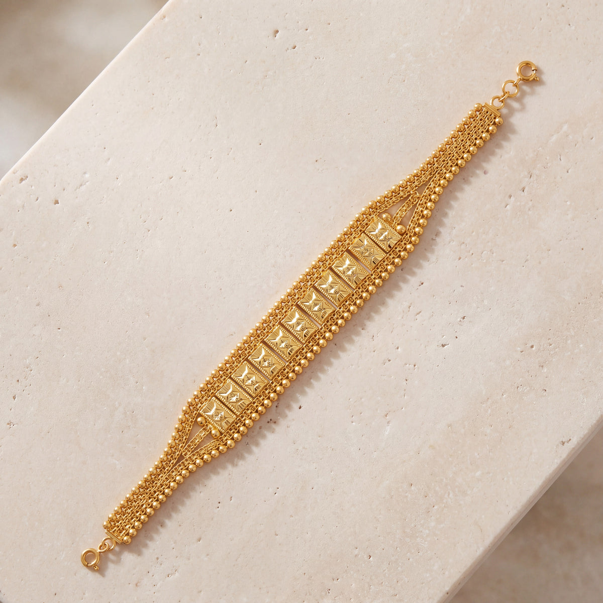 Patta Bracelet (D6) on travertine