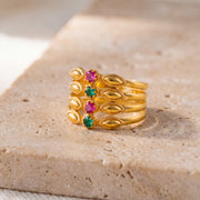 Quad Line Ring with stones (D1) on travertine