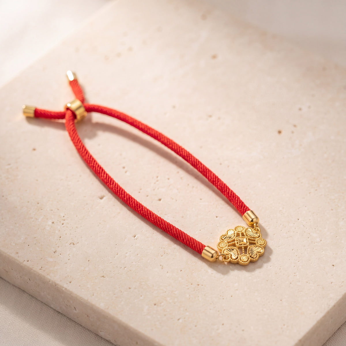 Round Hearts Thread Bracelet on travertine