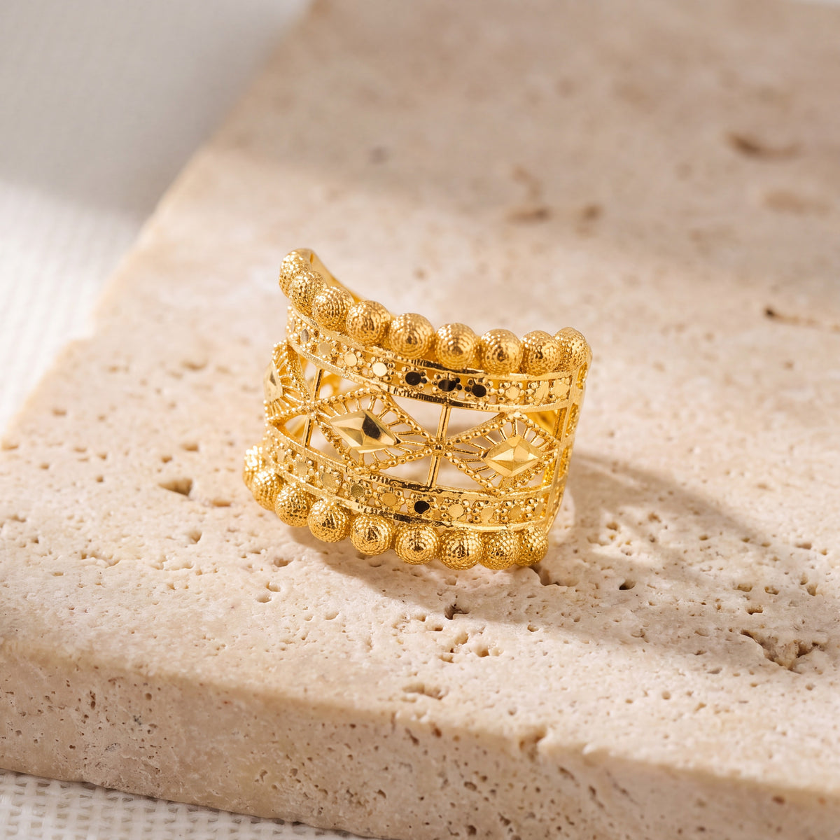 RP Ball Rings (DMND) on travertine