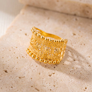 RP Ball Rings (Flower) on travertine