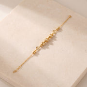 RP Beads & Ball Bracelet (D101) on travertine