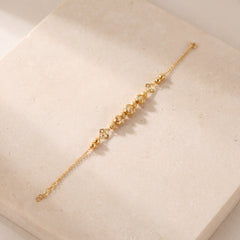 RP Beads & Ball Bracelet (D101) on travertine
