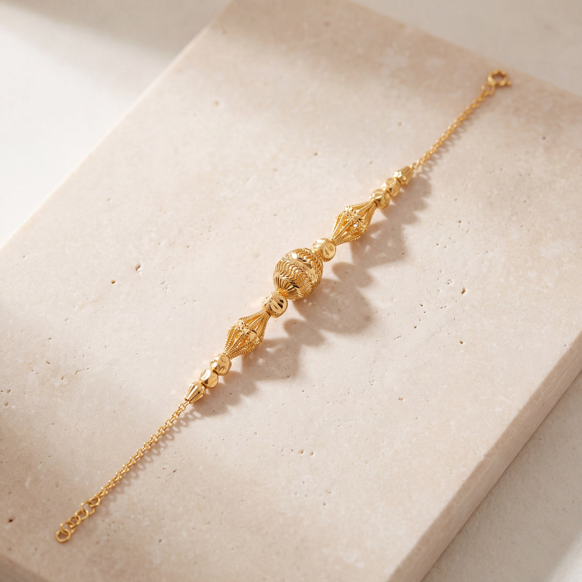 RP Beads & Ball Bracelet (D103) on travertine