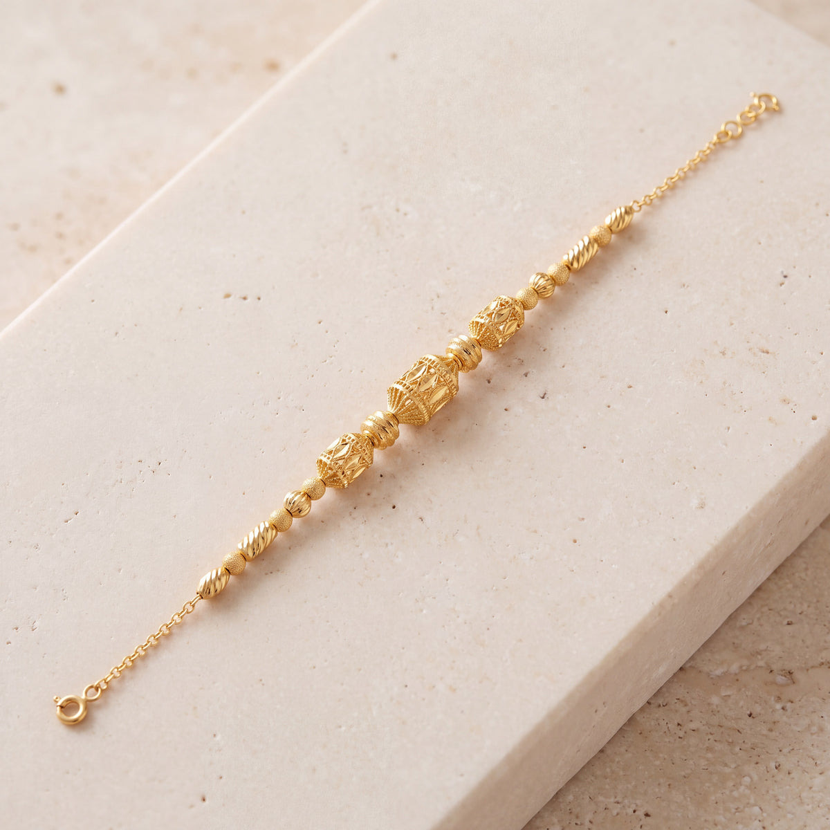RP Beads & Ball Bracelet (D105) on travertine