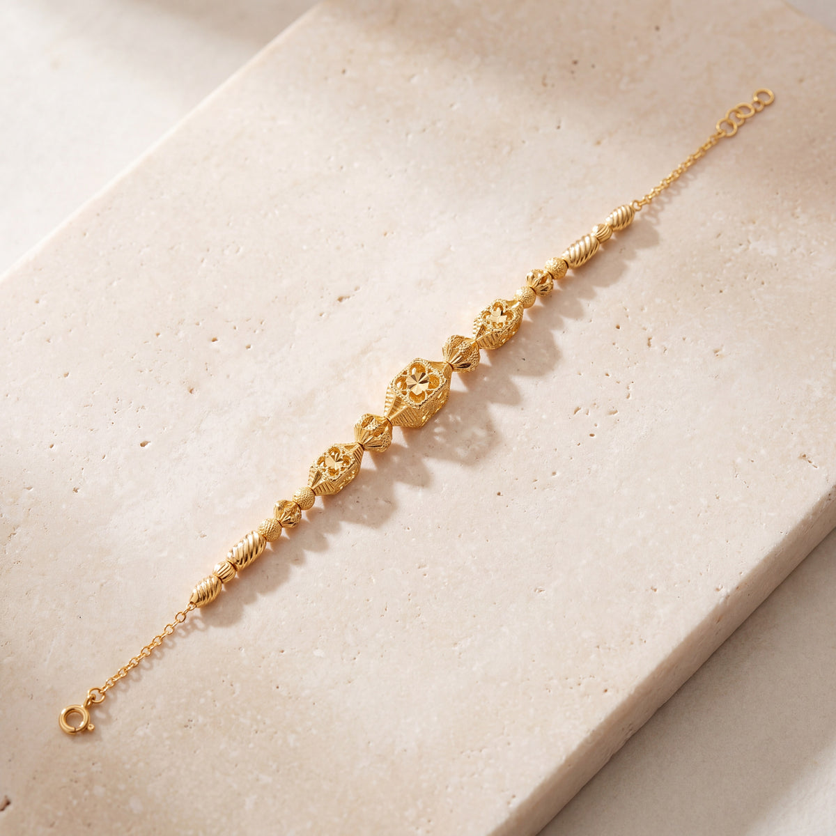 RP Beads & Ball Bracelet (D106) on travertine