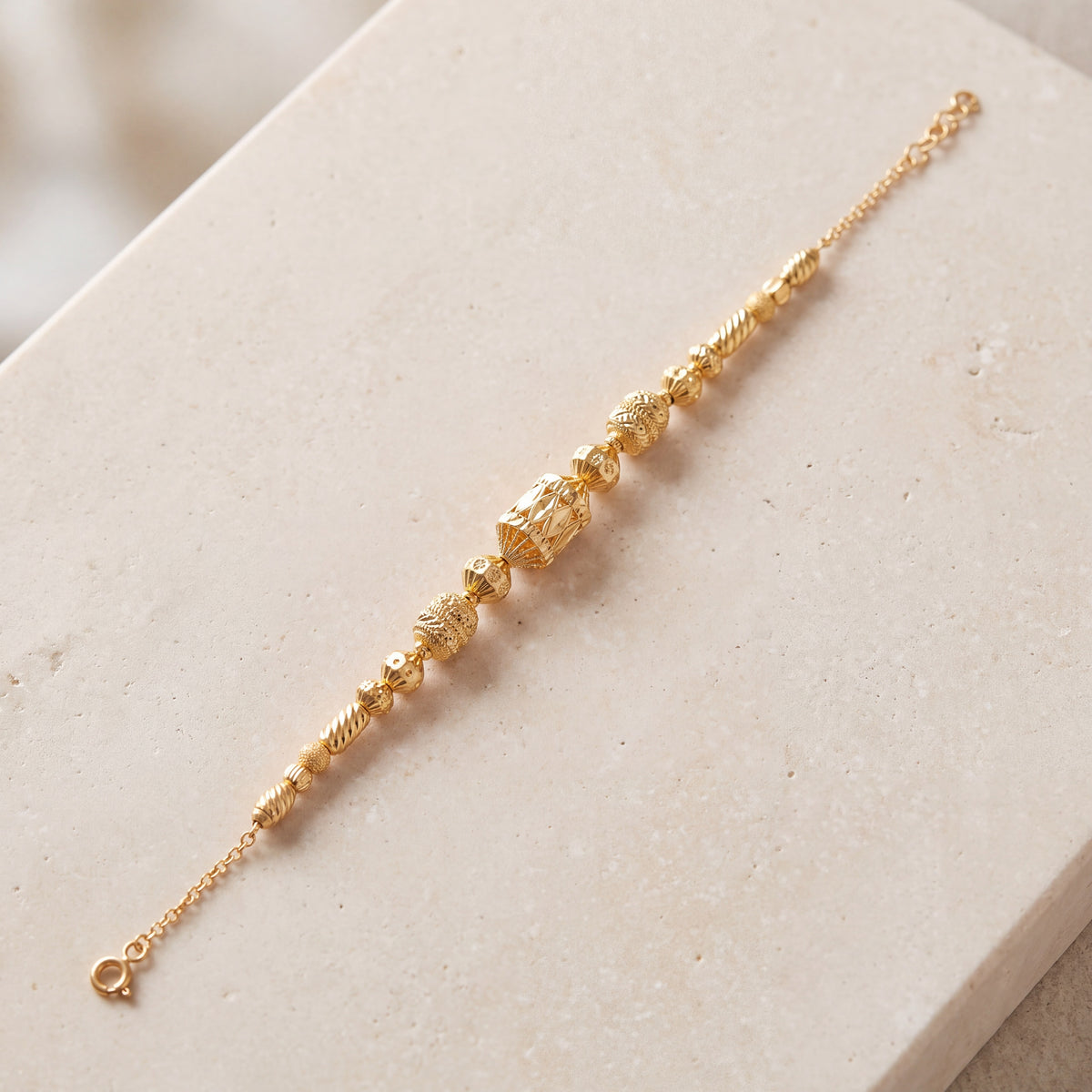 RP Beads & Ball Bracelet (D107) on travertine