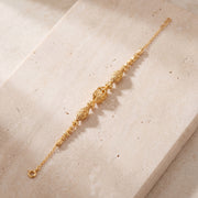 RP Beads & Ball Bracelet (D110) on travertine