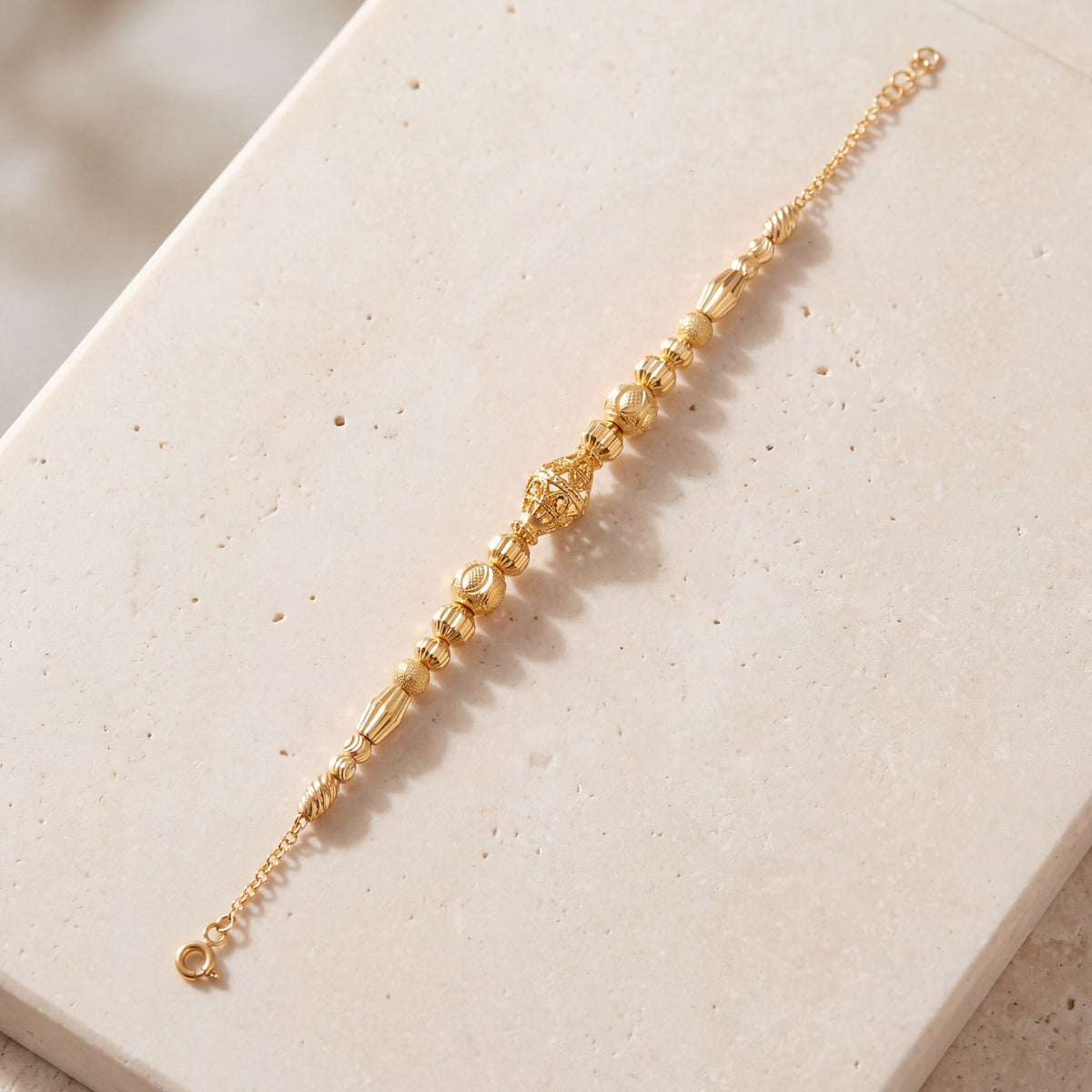 RP Beads & Ball Bracelet (D111) on travertine