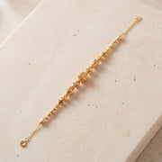 RP Beads & Ball Bracelet (D112) on travertine