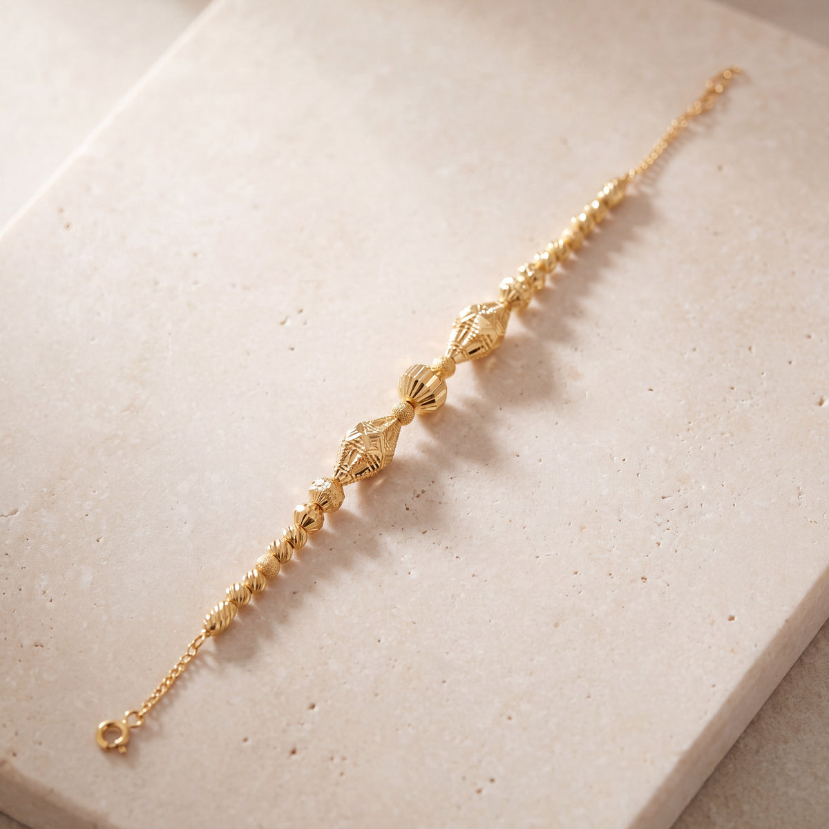 RP Beads & Ball Bracelet (D114) on travertine