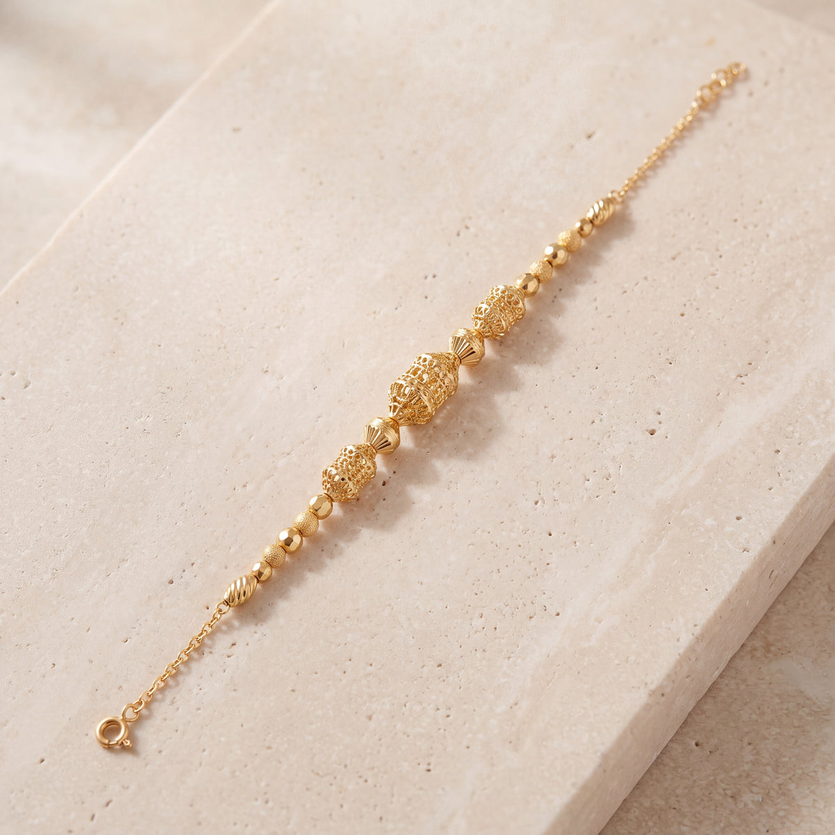 RP Beads & Ball Bracelet (D115) on travertine
