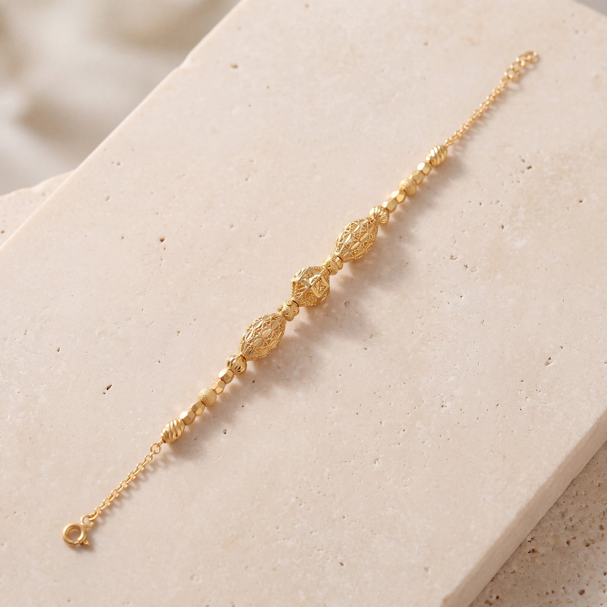 RP Beads & Ball Bracelet (D116) on travertine