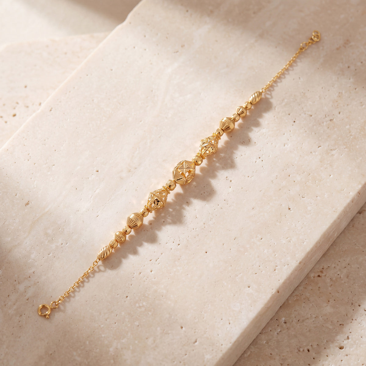 RP Beads & Ball Bracelet (D118) on travertine