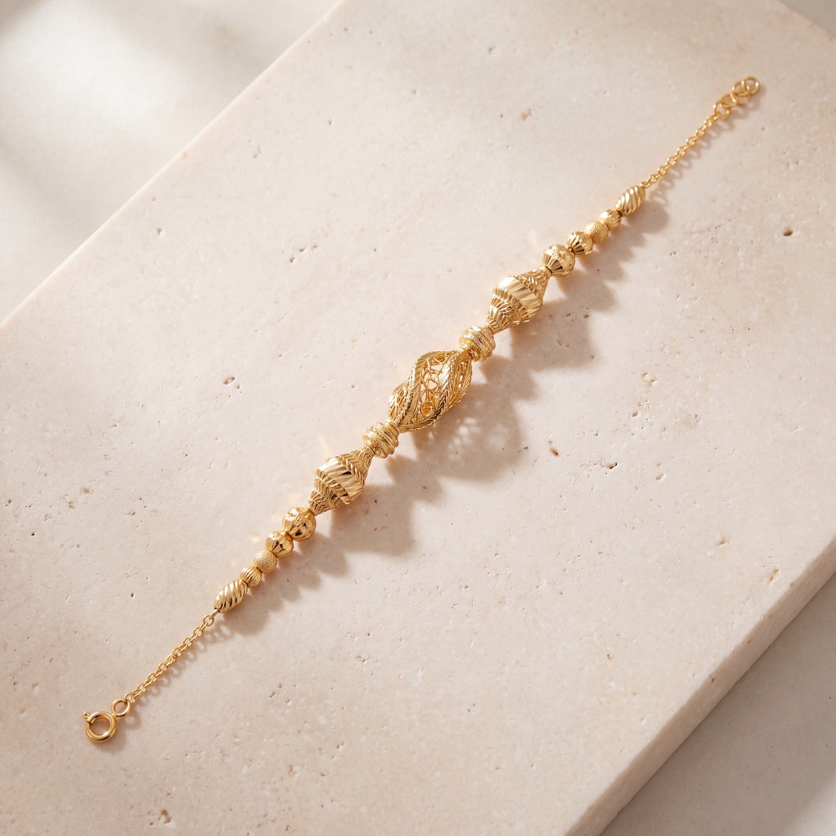 RP Beads & Ball Bracelet (D119) on travertine