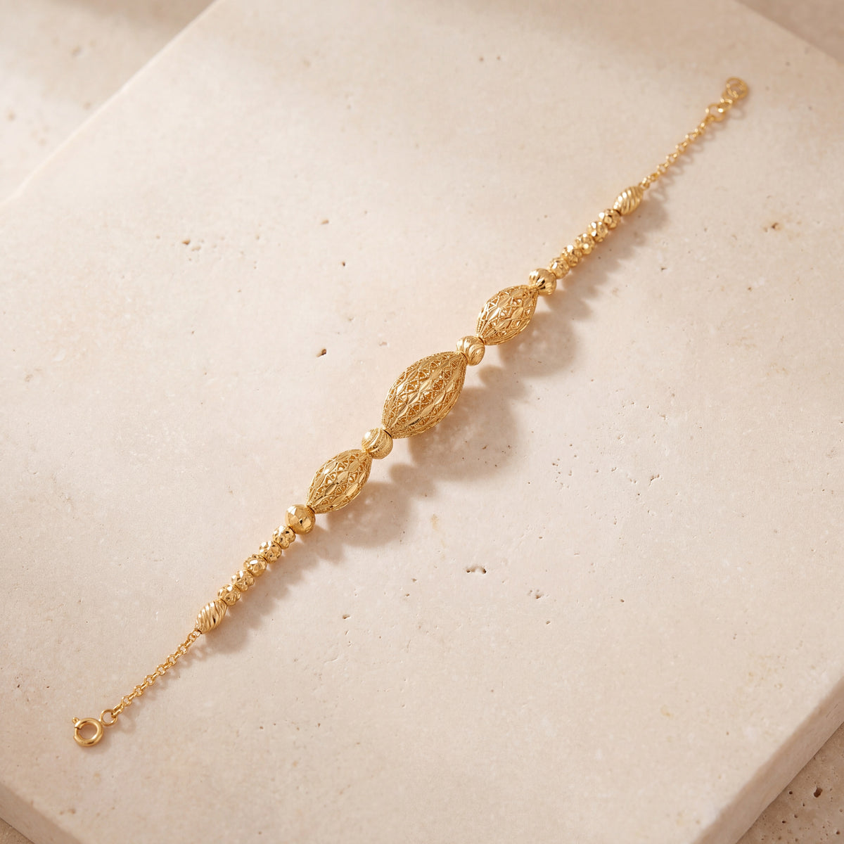 RP Beads & Ball Bracelet (D120) on travertine