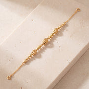 RP Beads & Ball Bracelet (D121) on travertine