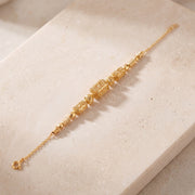 RP Beads & Ball Bracelet (D122) on travertine