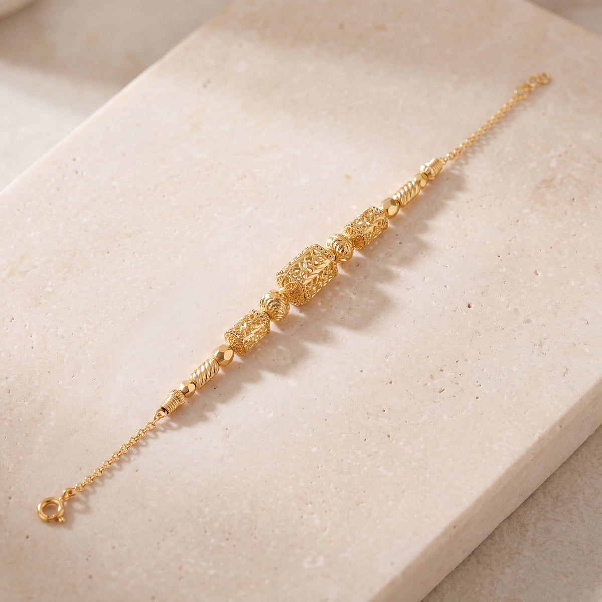 RP Beads & Ball Bracelet (D122) on travertine