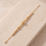 RP Beads & Ball Bracelet (D123) on travertine
