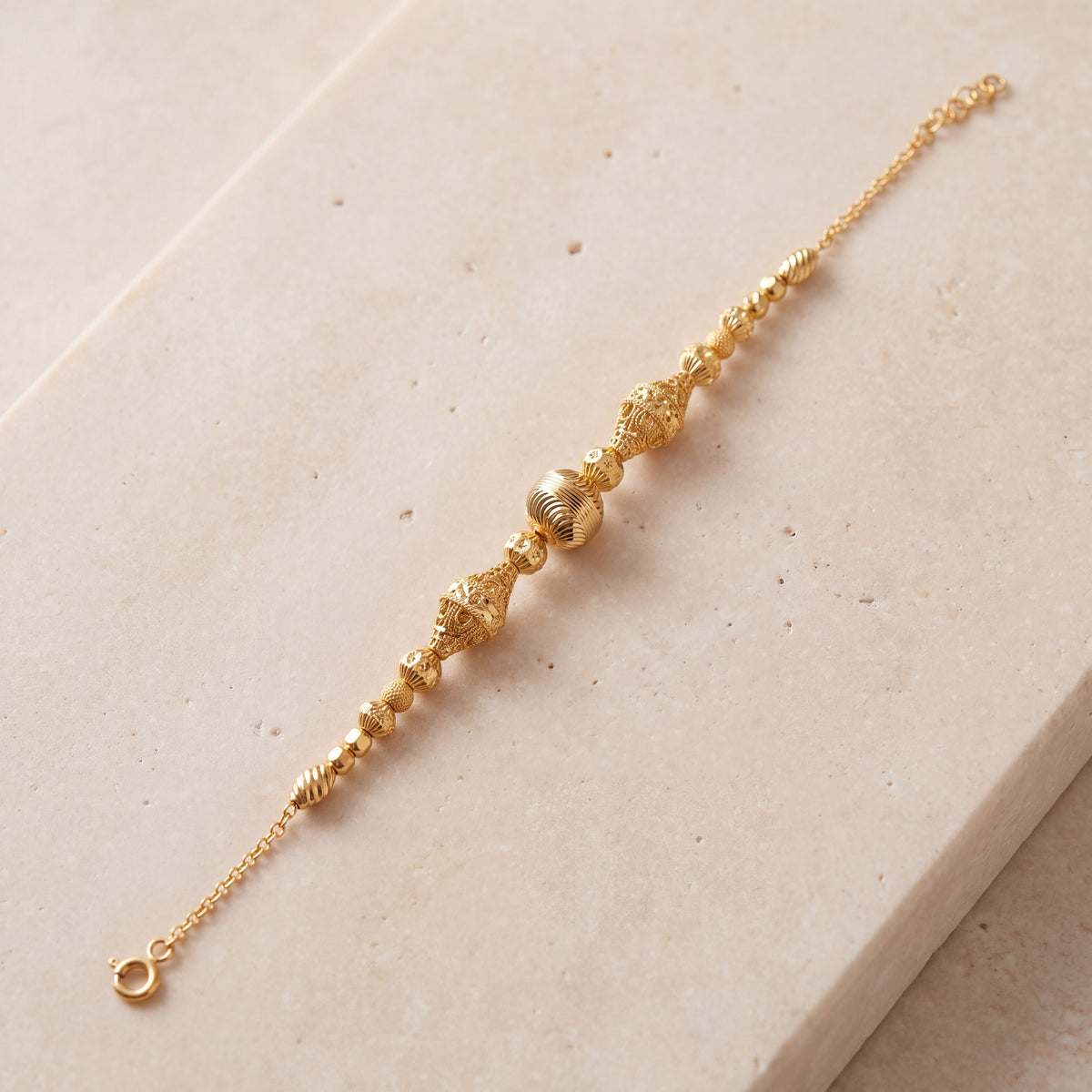 RP Beads & Ball Bracelet (D126) on travertine