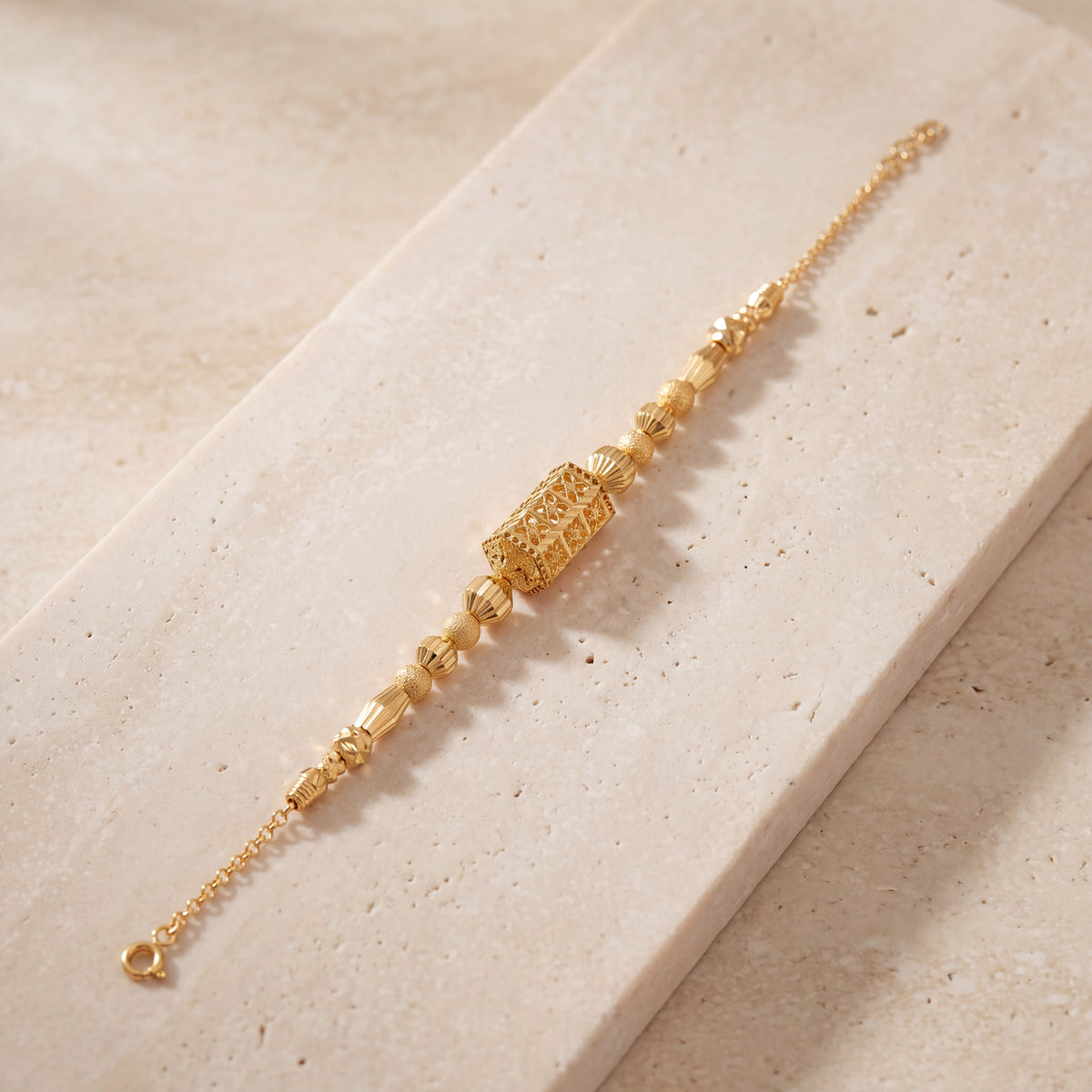 RP Beads & Ball Bracelet (D127) on travertine