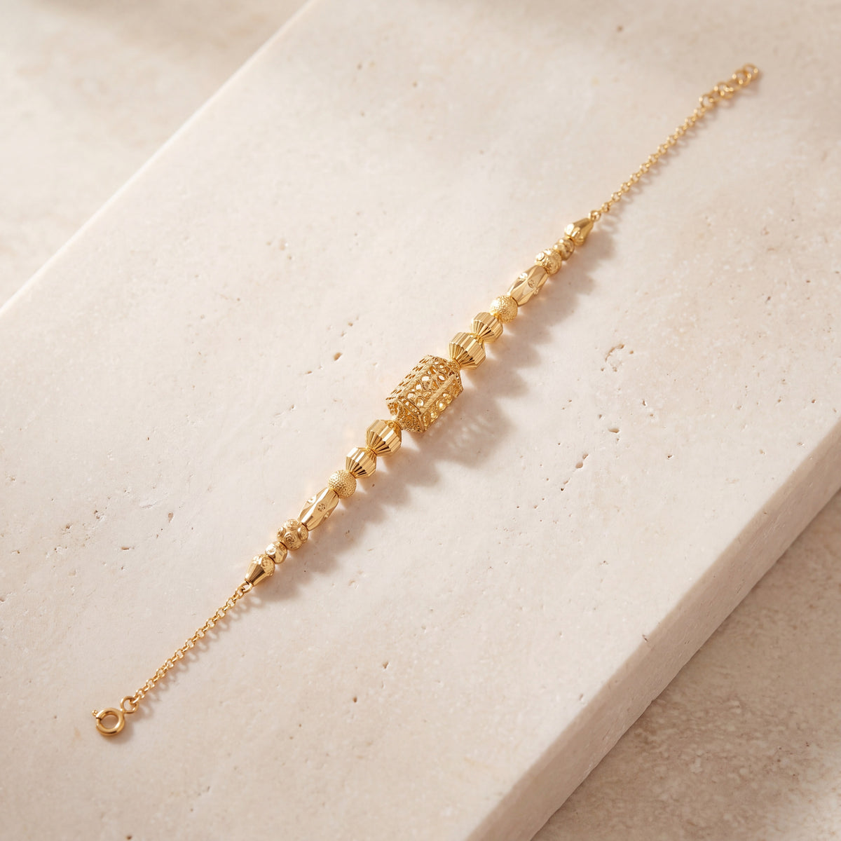 RP Beads & Ball Bracelet (D128) on travertine