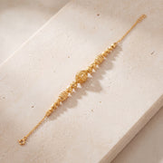 RP Beads & Ball Bracelet (D133) on travertine