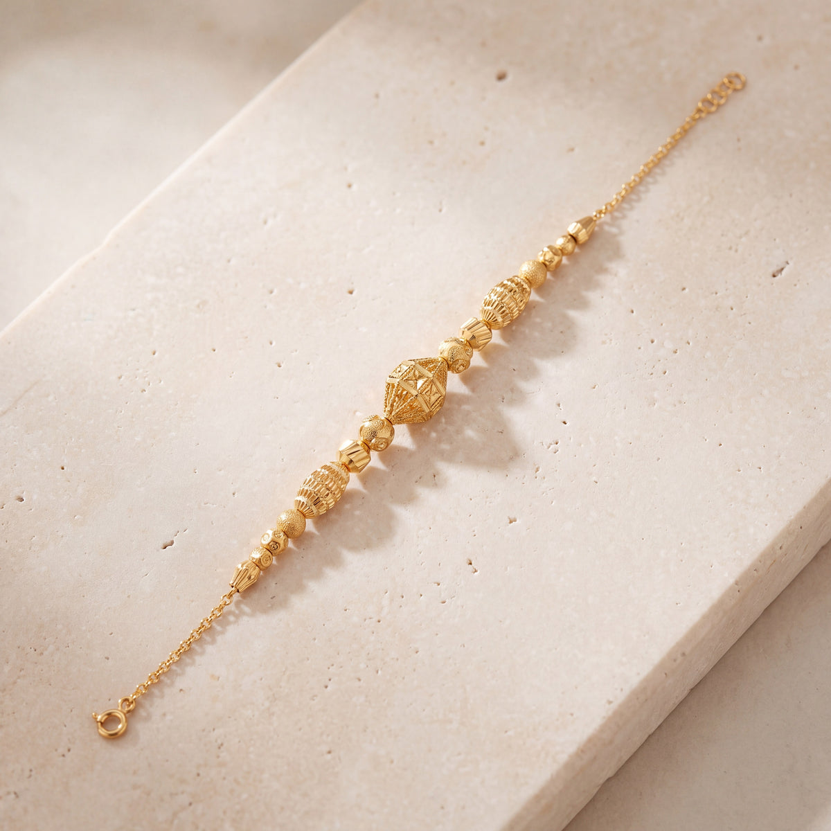 RP Beads & Ball Bracelet (D133) on travertine