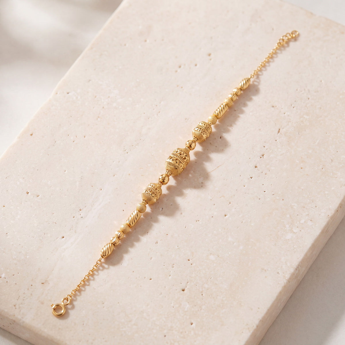 RP Beads & Ball Bracelet (D135) on travertine